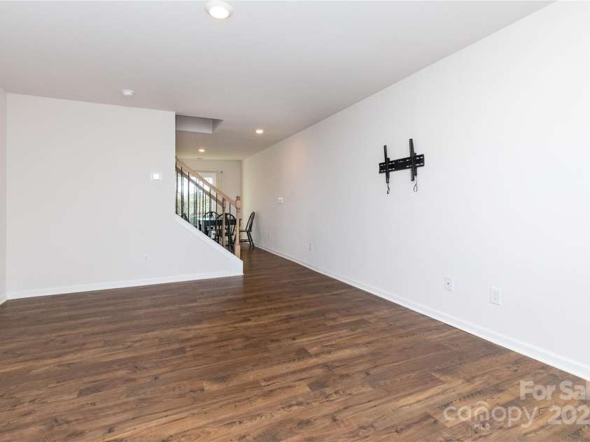 103 Gregory Court, Weaverville, NC 28787.  MLS# CAR4211989, YatesRealty ID 5745. Living room looking toward kitchen