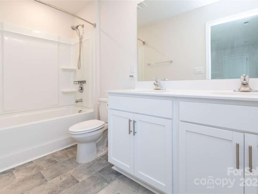 103 Gregory Court, Weaverville, NC 28787.  MLS# CAR4211989, YatesRealty ID 5745. Primary bath with dual sinks