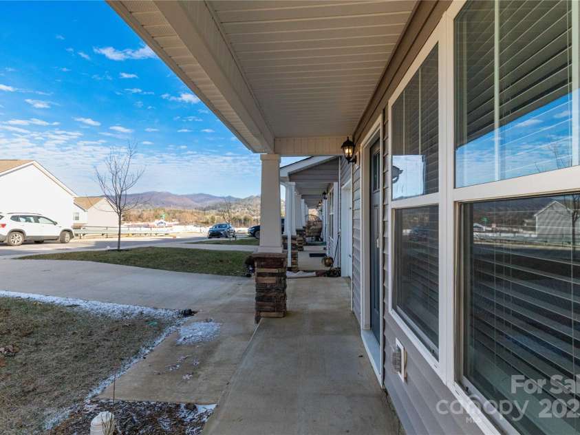 103 Gregory Court, Weaverville, NC 28787.  MLS# CAR4211989, YatesRealty ID 5745. View from front porch