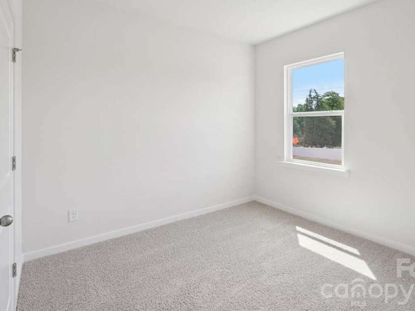 7 Piney Woods Road, Fletcher, NC 28732.  MLS# CAR4435919, YatesRealty ID 57468. Photos are representative