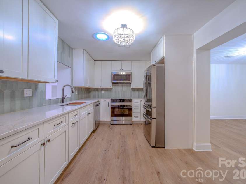 115 Silver Dapple Lane, Hendersonville, NC 28792.  MLS# CAR4434968, YatesRealty ID 57472. 