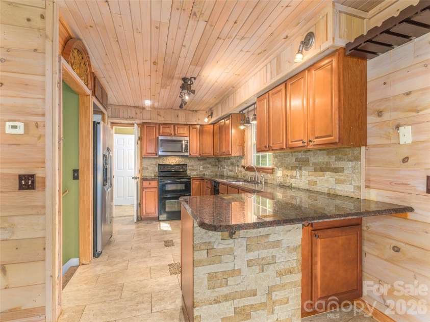 99 Cripple Creek Road, Waynesville, NC 28785.  MLS# CAR4435944, YatesRealty ID 57486. 