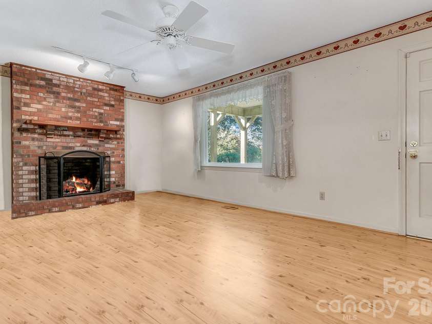 1 Dewberry Lane, Hendersonville, NC 28792.  MLS# CAR4435645, YatesRealty ID 57487. Entry way into great room