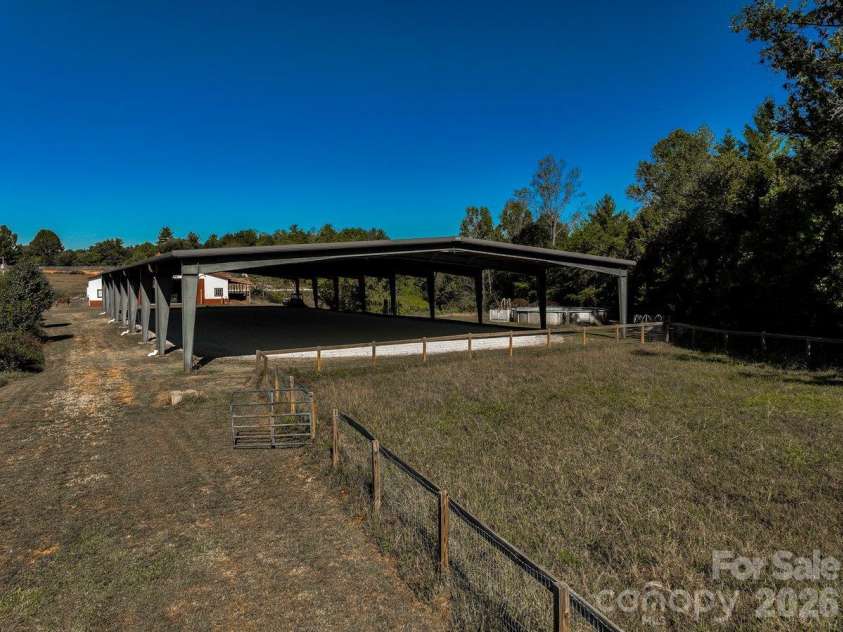 217 Flint Hill Road, Alexander, NC 28701.  MLS# CAR4432017, YatesRealty ID 57494. Covered Arena with GGT Footing