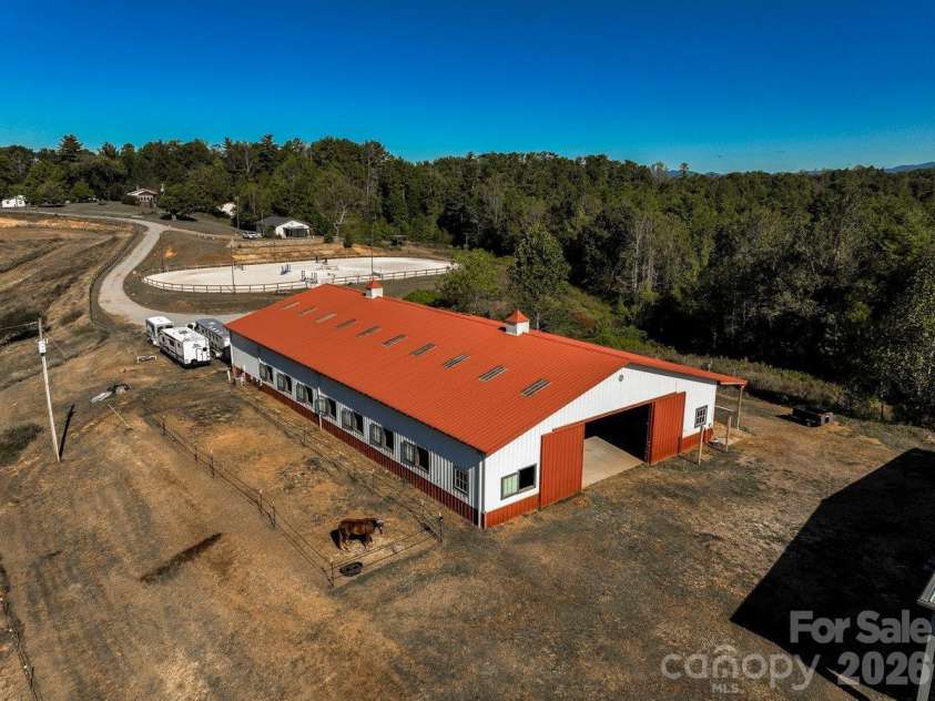 217 Flint Hill Road, Alexander, NC 28701.  MLS# CAR4432017, YatesRealty ID 57494. Welcome to Pegasus Hill Farm, an 18 Stall barn built in 2017. Conditioned space; see floor plan attached.