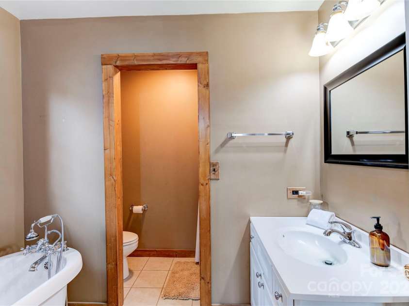 131 Mountain Ridge Drive, Lake Lure, NC 28746.  MLS# CAR4246824, YatesRealty ID 5755. 