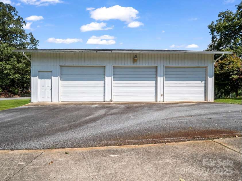 256 School Road, Mill Spring, NC 28756.  MLS# CAR4299323, YatesRealty ID 5755. 3-Car garage with electric