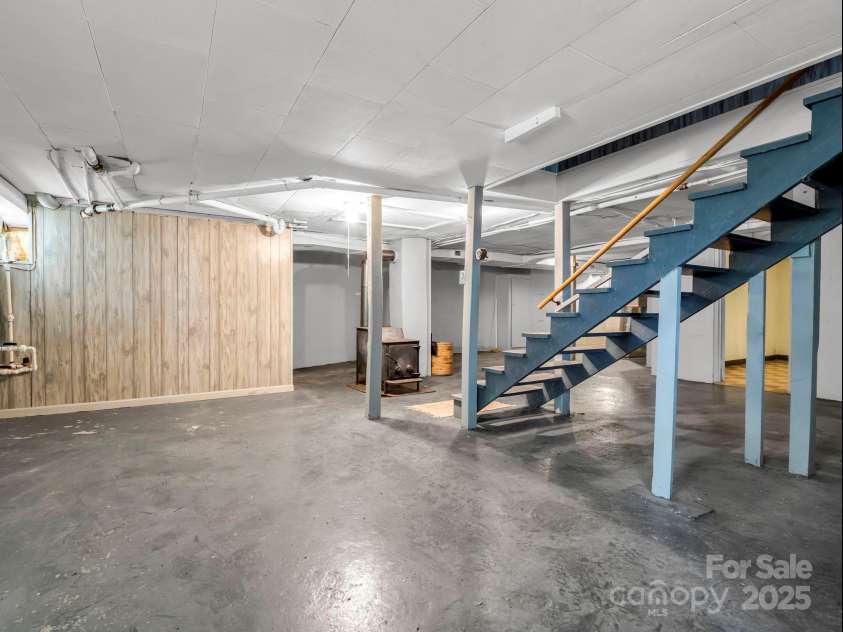 256 School Road, Mill Spring, NC 28756.  MLS# CAR4299323, YatesRealty ID 5755. Ceilings are just under 7' tall