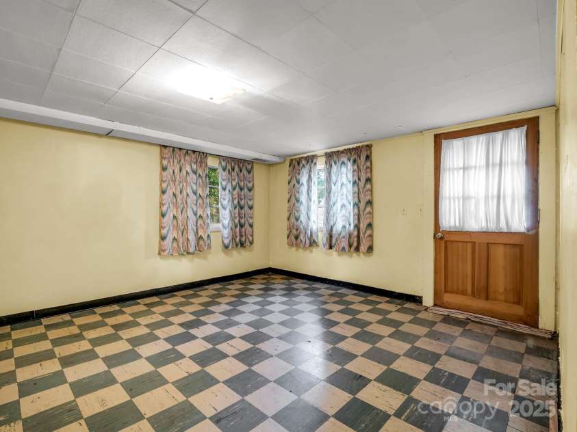 256 School Road, Mill Spring, NC 28756.  MLS# CAR4299323, YatesRealty ID 5755. Flex room for office, hobbies, studio or guest bedroom. Ceiling ~7'