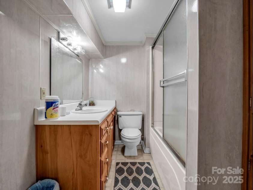 256 School Road, Mill Spring, NC 28756.  MLS# CAR4299323, YatesRealty ID 5755. Full bathroom in basement.