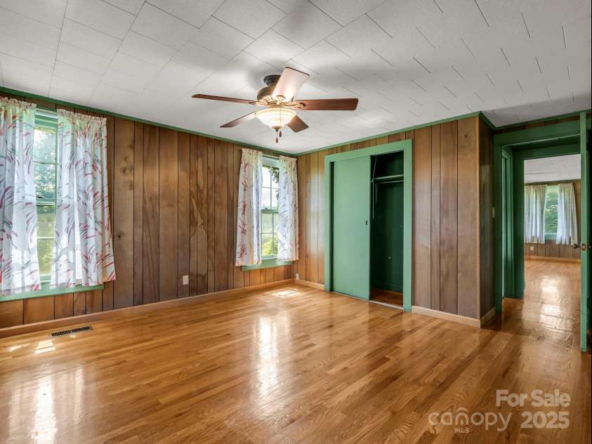 256 School Road, Mill Spring, NC 28756.  MLS# CAR4299323, YatesRealty ID 5755. Guest bedroom on the main level