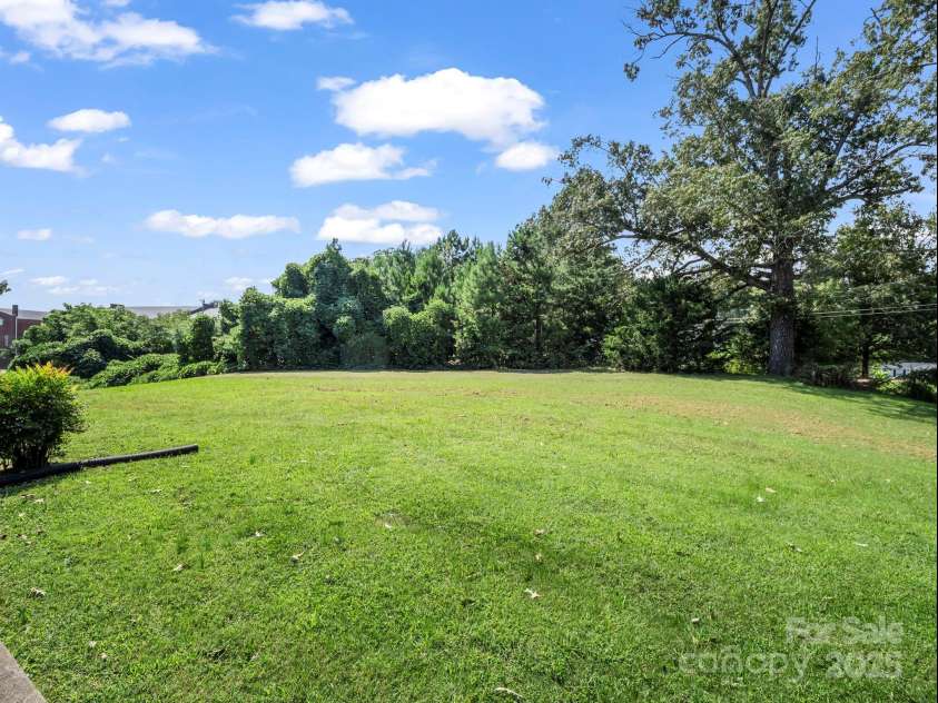 256 School Road, Mill Spring, NC 28756.  MLS# CAR4299323, YatesRealty ID 5755. Nice level space in front yard!