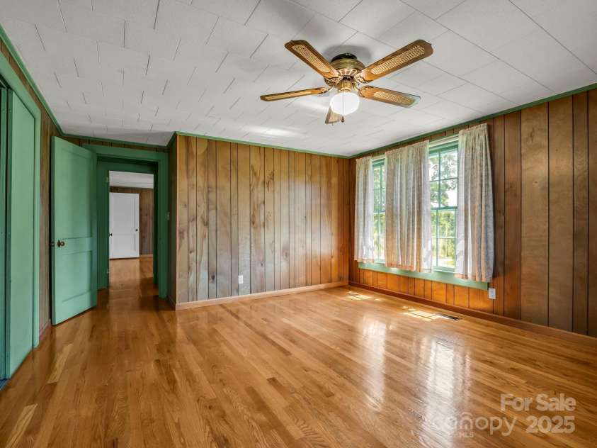 256 School Road, Mill Spring, NC 28756.  MLS# CAR4299323, YatesRealty ID 5755. Primary BR with beautiful hardwood floors!