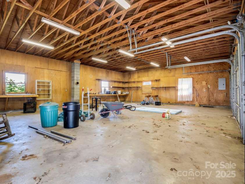 256 School Road, Mill Spring, NC 28756.  MLS# CAR4299323, YatesRealty ID 5755. Spacious 3-Car garage with electric