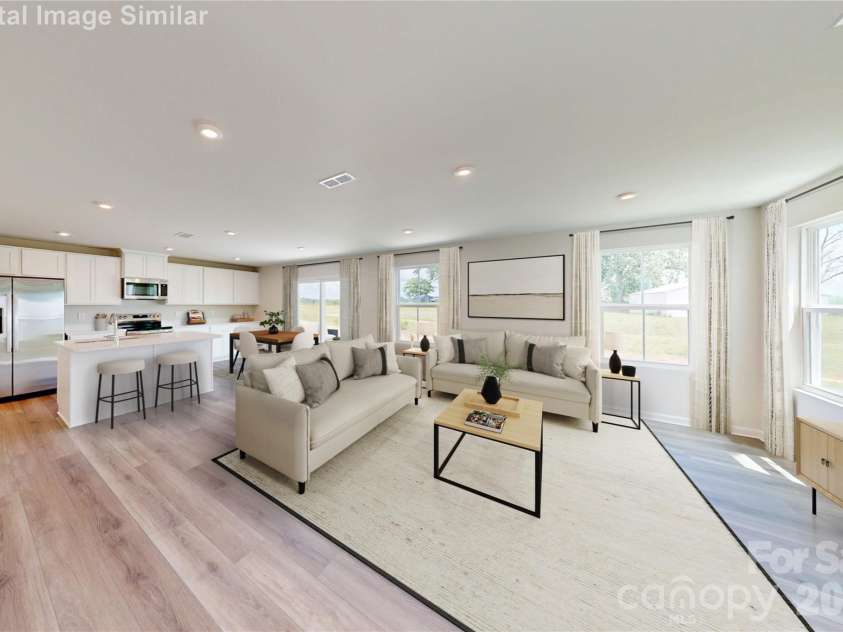 10012 Florentine Way, Charlotte, NC 28214.  MLS# CAR4436111, YatesRealty ID 57562. Wide open spaces, sunshine galore! This kitchen and great room combo is bursting with light, style, and room to live your best life!