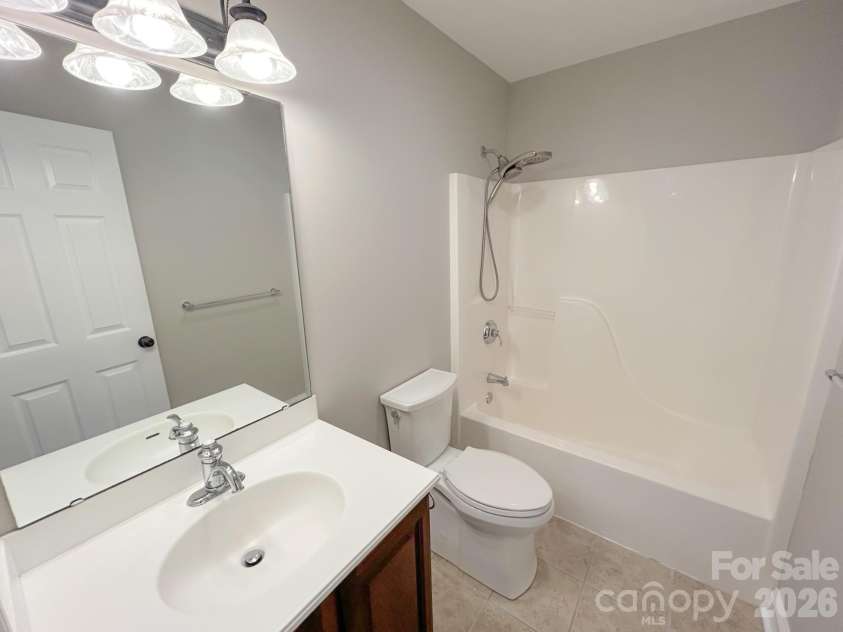 201 Colonel Holcombe Place, Candler, NC 28715.  MLS# CAR4436091, YatesRealty ID 57568. Upper Level Hall Bathroom