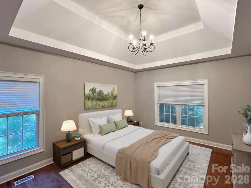 201 Colonel Holcombe Place, Candler, NC 28715.  MLS# CAR4436091, YatesRealty ID 57568. Virtually Staged Primary Bedroom with  tray ceiling