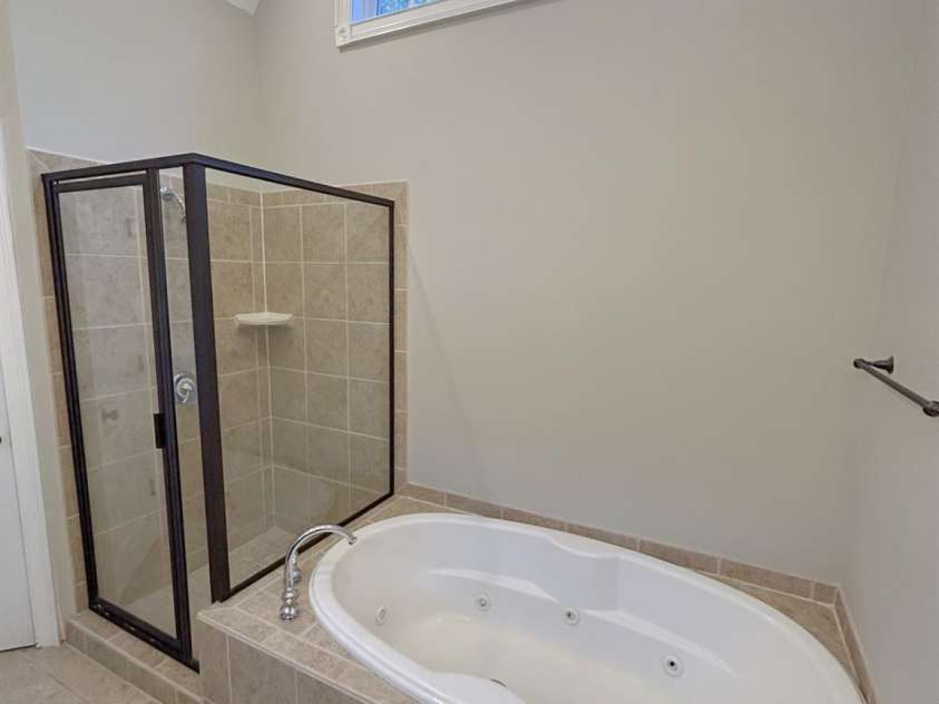 201 Colonel Holcombe Place, Candler, NC 28715.  MLS# CAR4436091, YatesRealty ID 57568. Whirlpool and separate shower