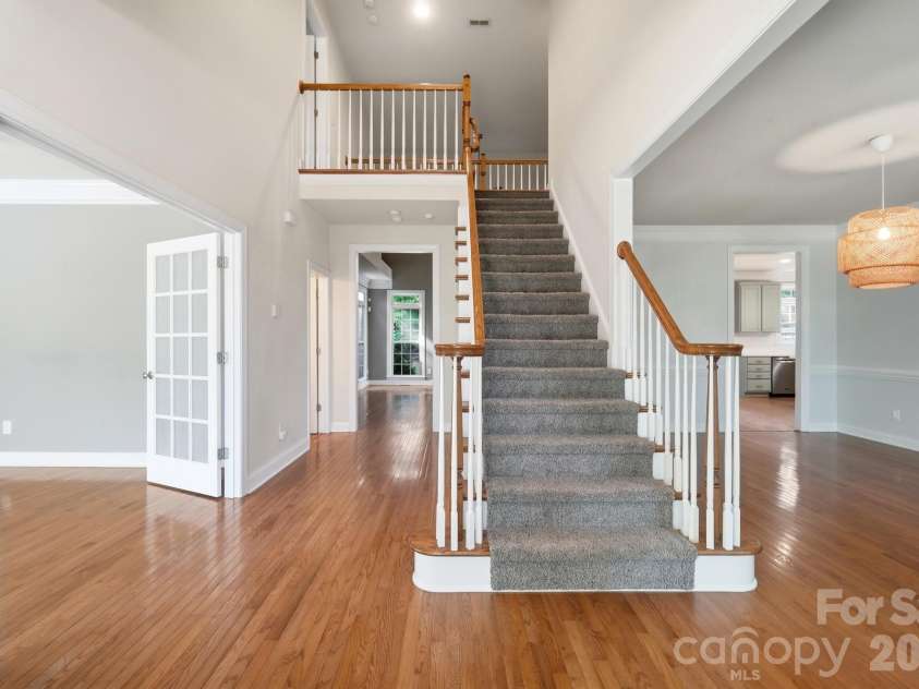 9915 Nicole Lane, Charlotte, NC 28269.  MLS# CAR4396423, YatesRealty ID 5758. Main Staircase