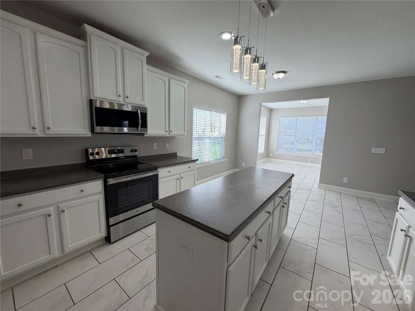 1003 Defoor Court, Indian Trail, NC 28079.  MLS# CAR4435511, YatesRealty ID 57590. 