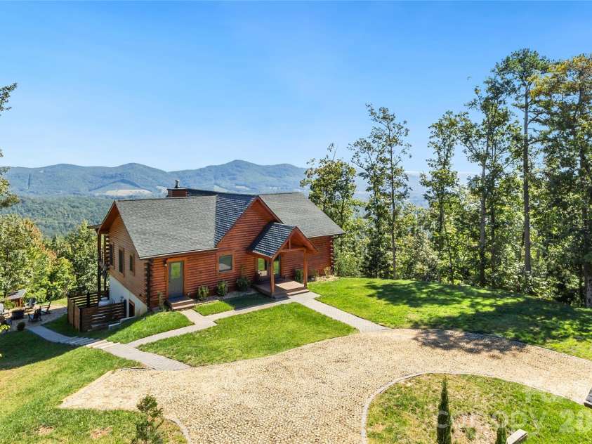 656 Arbra Mountain Way, Bostic, NC 28018.  MLS# CAR4432253, YatesRealty ID 57598. Flat / Level Yard with Parking Area and Garage (to right)