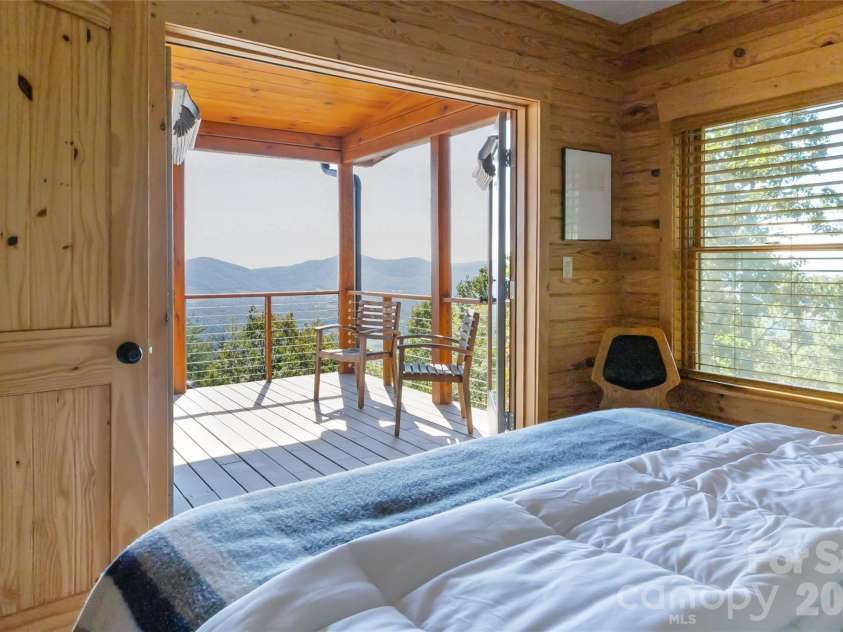 656 Arbra Mountain Way, Bostic, NC 28018.  MLS# CAR4432253, YatesRealty ID 57598. Main - Second Bedroom looking out to covered deck