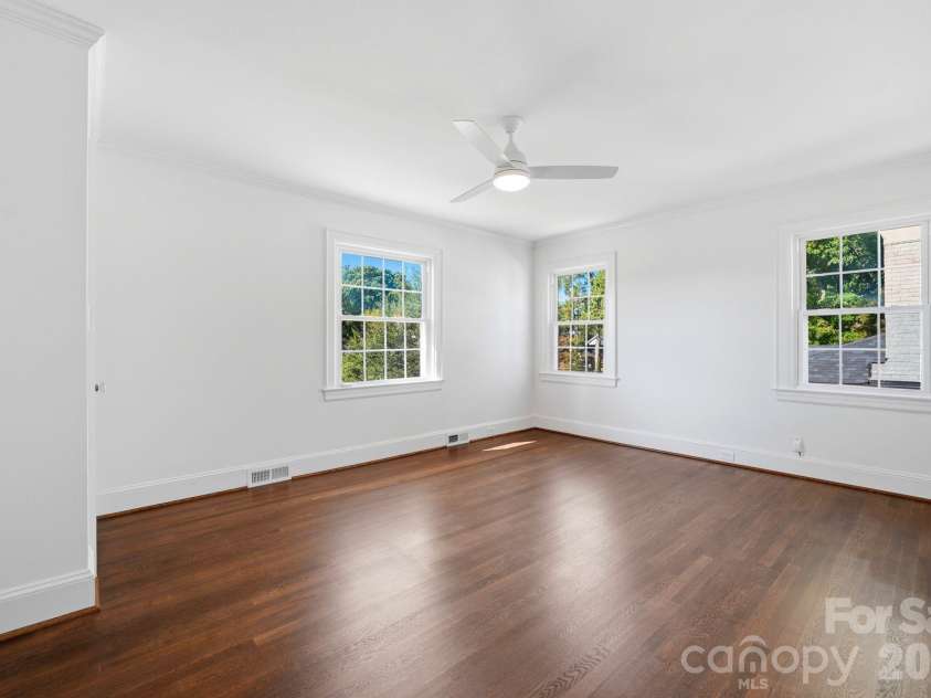 1307 Kings Drive, Charlotte, NC 28207.  MLS# CAR4432862, YatesRealty ID 57599. Unit A Primary bedroom