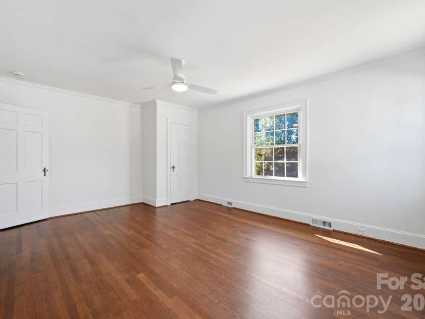 1307 Kings Drive, Charlotte, NC 28207.  MLS# CAR4432862, YatesRealty ID 57599. Unit A Primary Bedroom