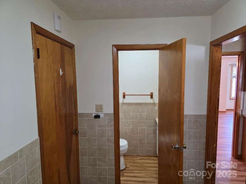 1375 US Highway 19E Highway, Burnsville, NC 28714.  MLS# CAR4329254, YatesRealty ID 576. Half bathroom in mud/laundry room