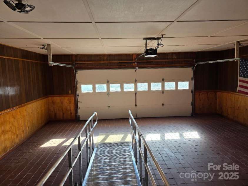 1375 US Highway 19E Highway, Burnsville, NC 28714.  MLS# CAR4329254, YatesRealty ID 576. Interior of the attached garage