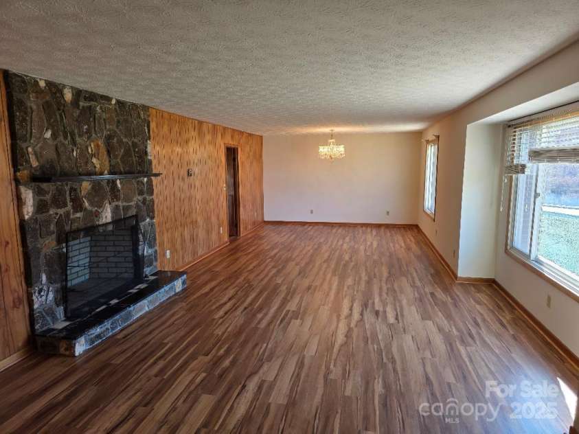 1375 US Highway 19E Highway, Burnsville, NC 28714.  MLS# CAR4329254, YatesRealty ID 576. Living room and dining room