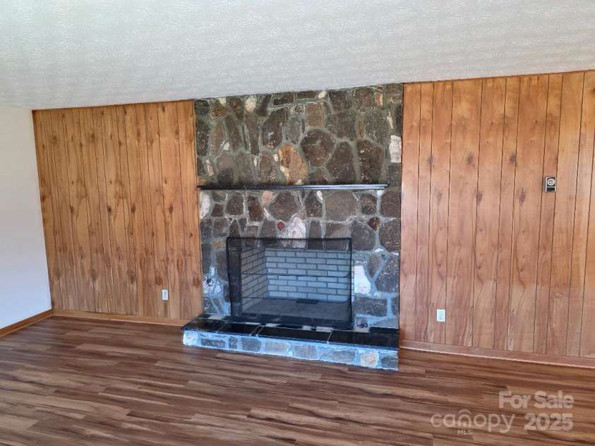 1375 US Highway 19E Highway, Burnsville, NC 28714.  MLS# CAR4329254, YatesRealty ID 576. Living room. Fireplace #2