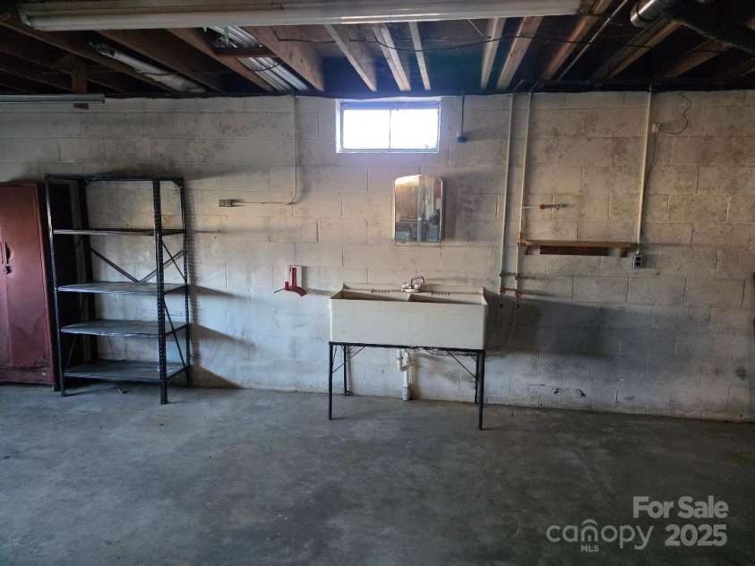 1375 US Highway 19E Highway, Burnsville, NC 28714.  MLS# CAR4329254, YatesRealty ID 576. Sink in the basement