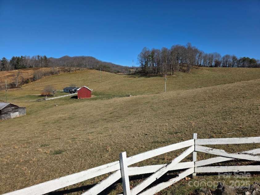 1375 US Highway 19E Highway, Burnsville, NC 28714.  MLS# CAR4329254, YatesRealty ID 576. View from northeast corner of the lawn