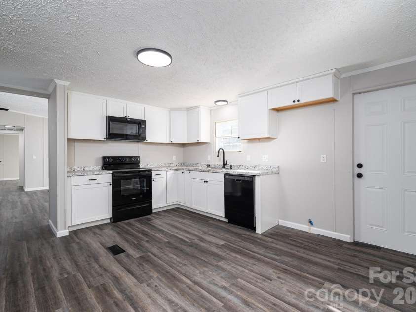 5047 Longbow Pointe, Kings Mountain, NC 28086.  MLS# CAR4436192, YatesRealty ID 57607. Kitchen door leads to back deck