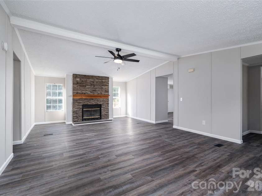 5047 Longbow Pointe, Kings Mountain, NC 28086.  MLS# CAR4436192, YatesRealty ID 57607. Living Room complete with woodburning fireplace