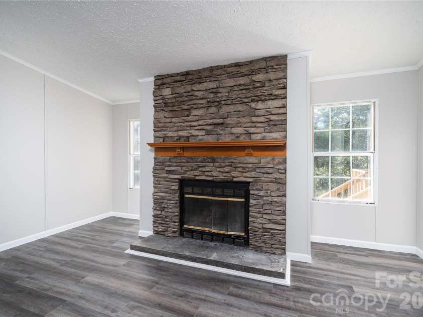 5047 Longbow Pointe, Kings Mountain, NC 28086.  MLS# CAR4436192, YatesRealty ID 57607. Rock wall fireplace