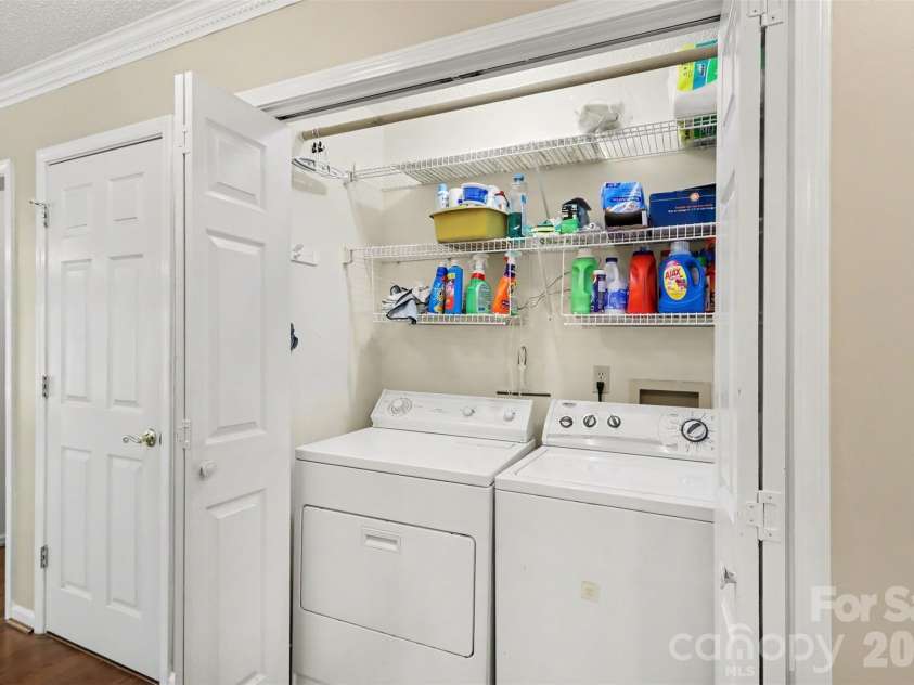 8407 Coulwood Oak Lane, Charlotte, NC 28214.  MLS# CAR4435190, YatesRealty ID 57608. Laundry
