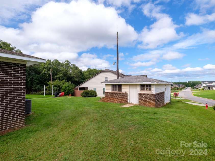 408 Pine Ridge Road, Duncan, SC 29334.  MLS# CAR4201970, YatesRealty ID 5761. Extra storage --needs a new roof