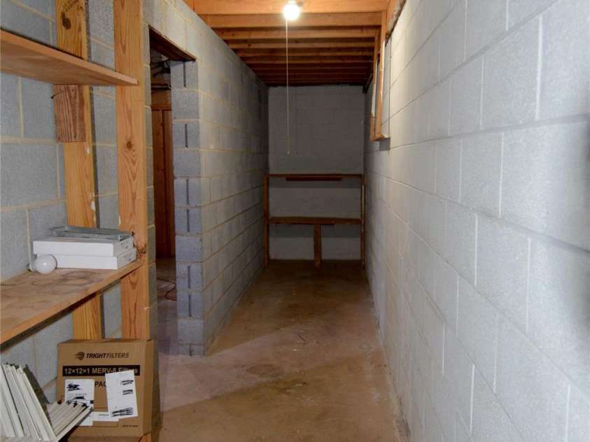 150 Eplee Loop, Marion, NC 28752.  MLS# CAR4435046, YatesRealty ID 57638. Unfinished basement