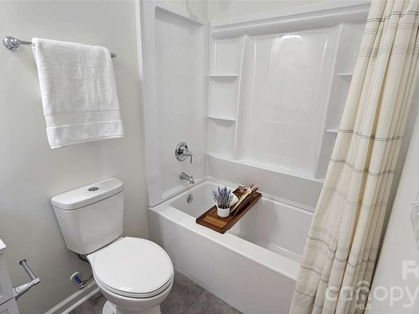 9610 Mcgruden Drive, Concord, NC 28027.  MLS# CAR4326805, YatesRealty ID 5765. Main guest suite bathroom
