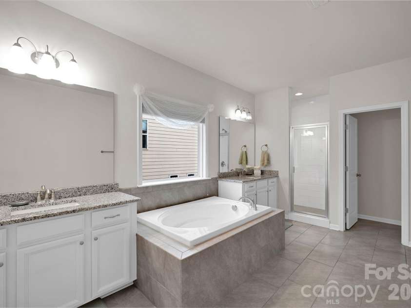 9610 Mcgruden Drive, Concord, NC 28027.  MLS# CAR4326805, YatesRealty ID 5765. Primary bathroom