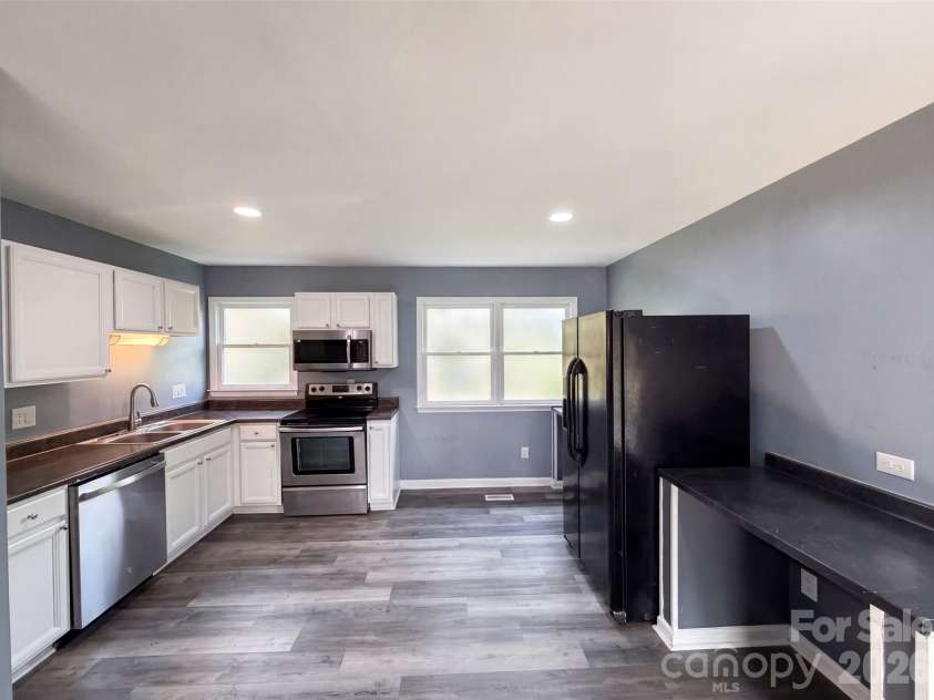 5601 Beaconsfield Road, Charlotte, NC 28214.  MLS# CAR4408741, YatesRealty ID 5767. Staged Photo
