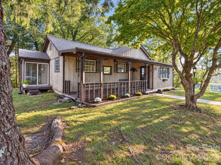 62 Hughey Drive, Mills River, NC 28759.  MLS# CAR4436207, YatesRealty ID 57671. Front and Side of House