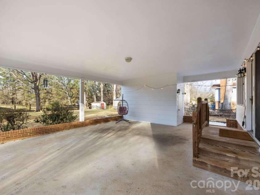 2431 Fox Hollow Road, Mint Hill, NC 28227.  MLS# CAR4334958, YatesRealty ID 57674. Carport