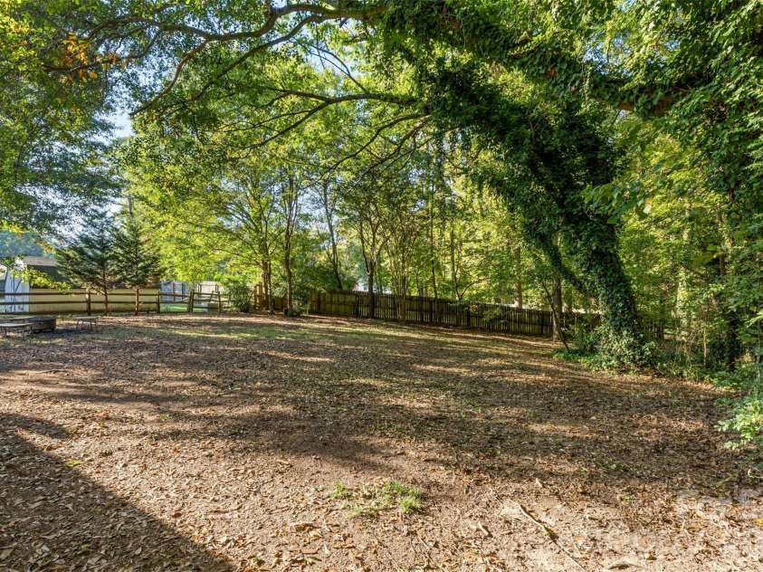 1312 Newfound Hollow Drive, Charlotte, NC 28214.  MLS# CAR4427413, YatesRealty ID 57695. Expansive and private backyard