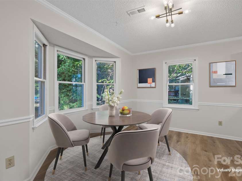 1312 Newfound Hollow Drive, Charlotte, NC 28214.  MLS# CAR4427413, YatesRealty ID 57695. Virtually Staged eat in kitchen