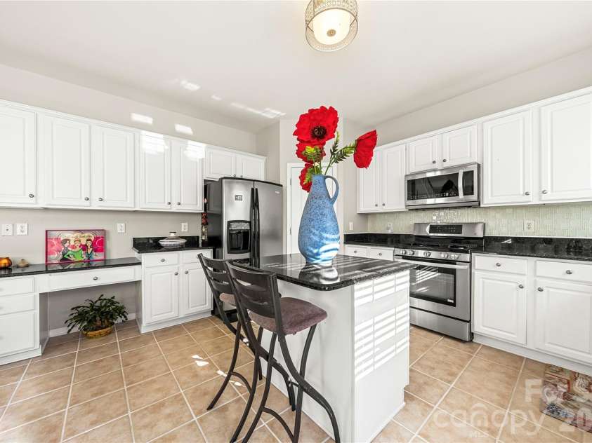 2602 Mullis Lane, Matthews, NC 28105.  MLS# CAR4436447, YatesRealty ID 57706. 