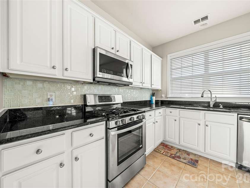 2602 Mullis Lane, Matthews, NC 28105.  MLS# CAR4436447, YatesRealty ID 57706. 