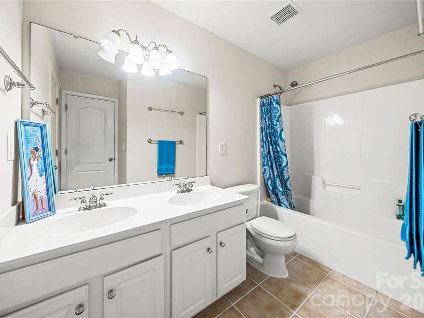 2602 Mullis Lane, Matthews, NC 28105.  MLS# CAR4436447, YatesRealty ID 57706. 